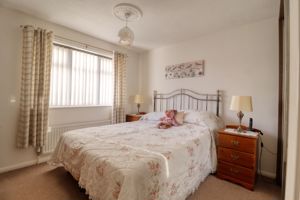 Bedroom One- click for photo gallery